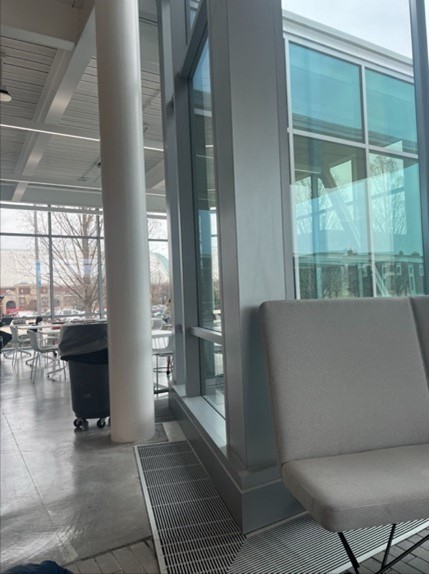 A white couches in a room Description automatically generated with medium confidence